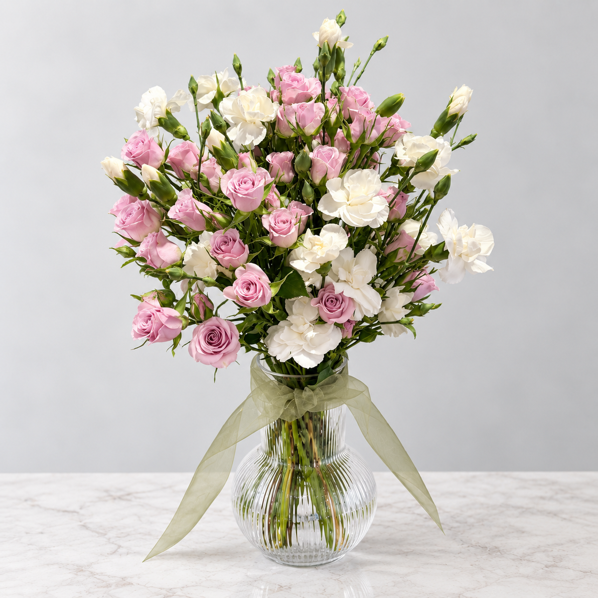 Soft blush roses & ivory carnations